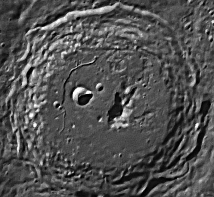 Lunar crater with rilles
